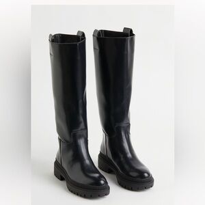 Faux leather High Shaft boots.